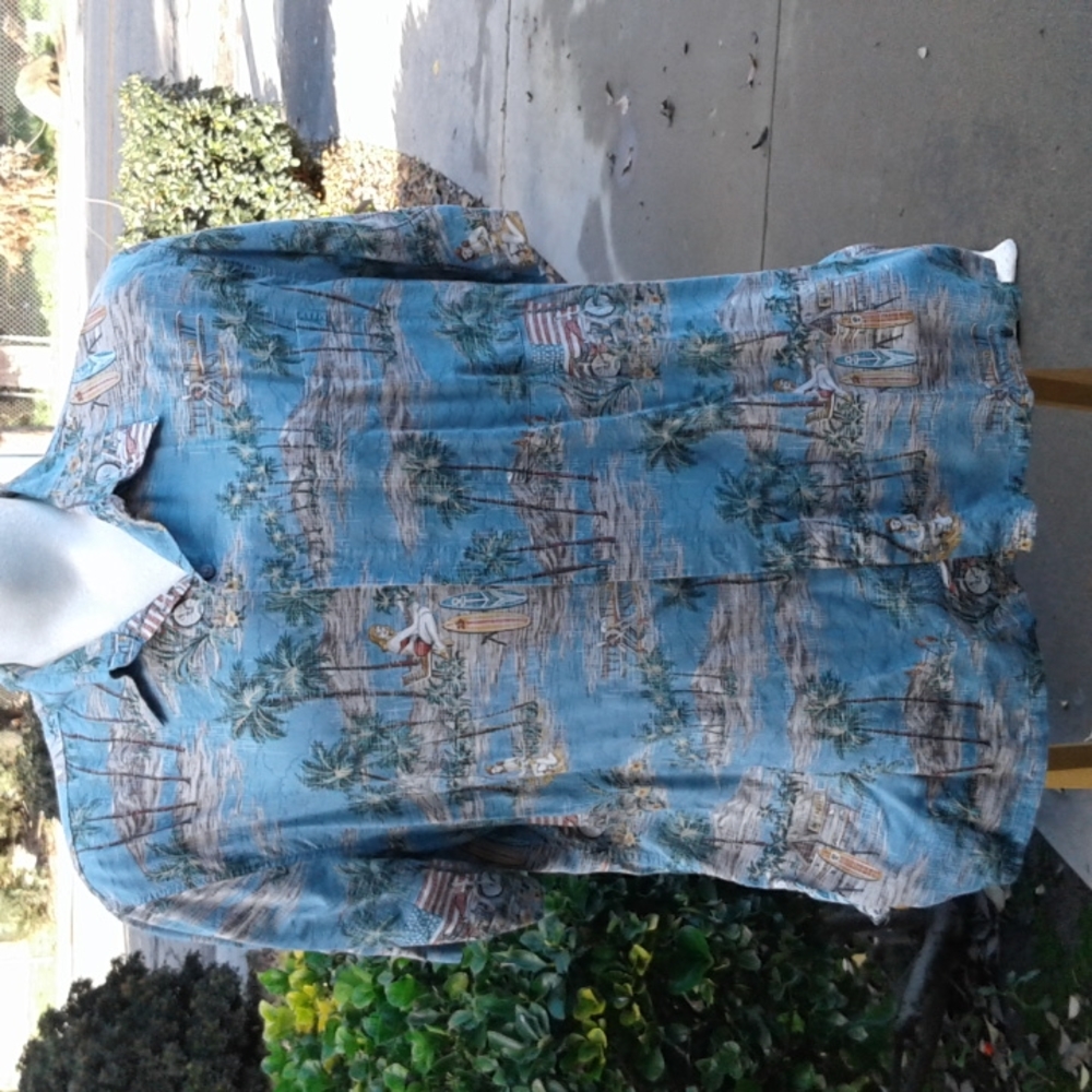 Men's extra large Hawaiian shirt has bikes playing surfboards and ladies on it